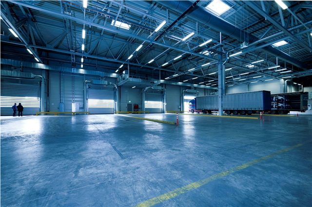 How are industrial automation systems applied in the automotive manufacturing industry?