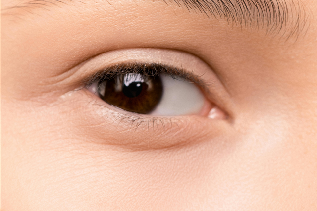 How can skincare products help in brightening skin tone?