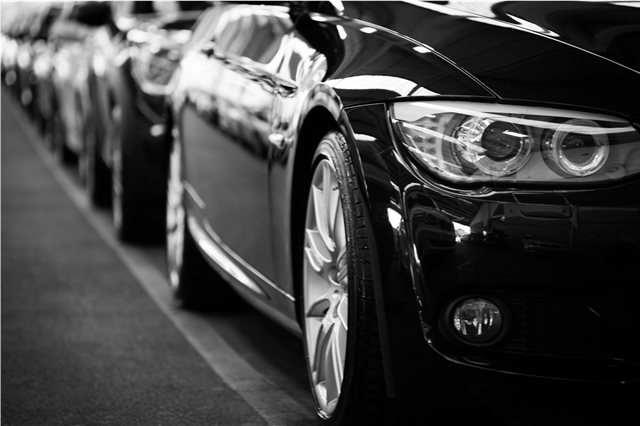 How do luxury cars offer a smooth and powerful performance on the road?