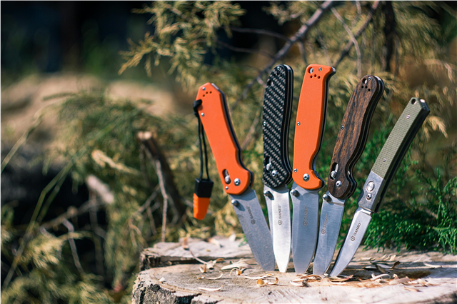How is a first aid kit used for treating injuries while camping?