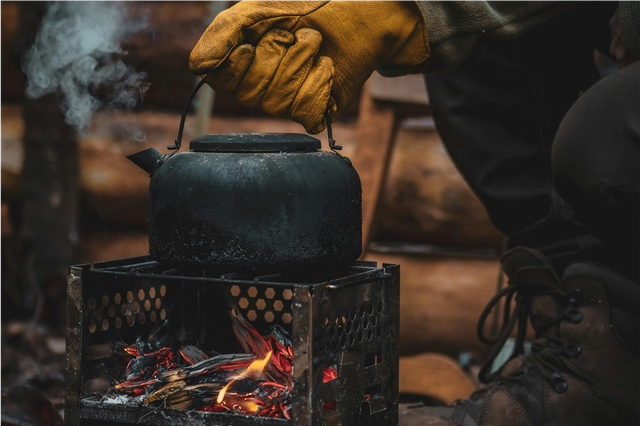 How is a multi-tool used for performing a variety of tasks during camping?