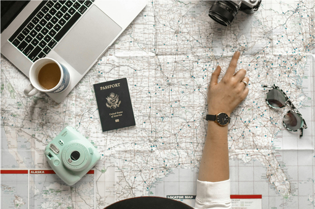 How is a travel blanket used during flights and road trips?