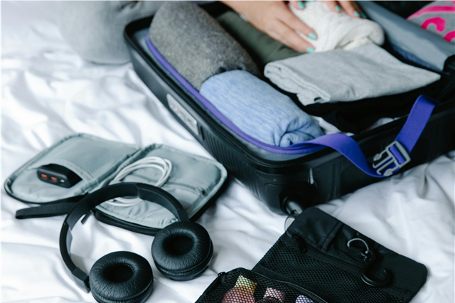 How is a universal travel adapter used across different countries?