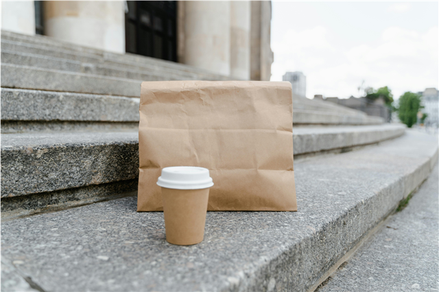 How is food waste management used in reducing environmental impact in the food industry?