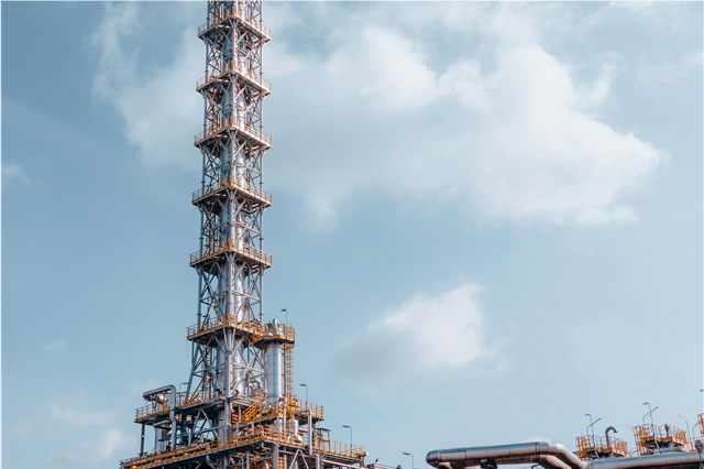 How is glass used in commercial construction projects?