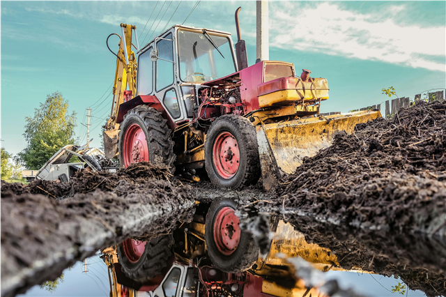 How is heavy machinery used in ports and shipping operations