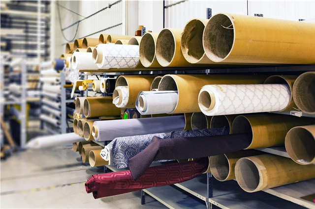 How is satin fabric used in creating elegant dresses and linings for garments?