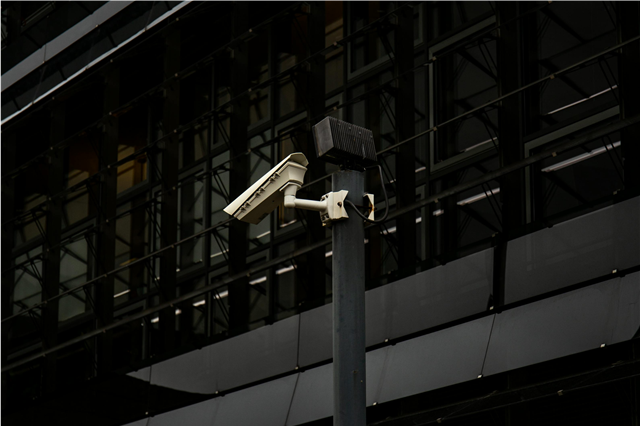 What are the benefits of using smart cameras in commercial surveillance?