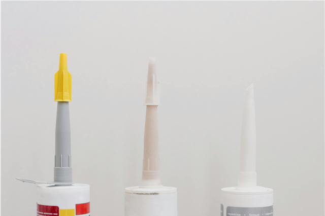 What are the safety precautions when using industrial adhesives