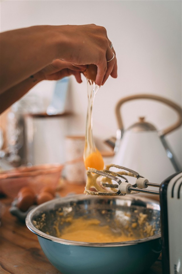 What are the uses of hand mixers in baking?