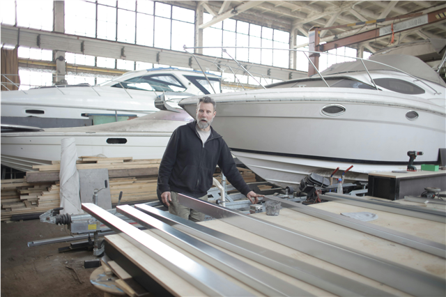 What are the uses of marine batteries in providing power to boats and ships?