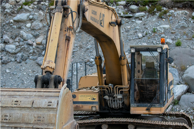 What role does heavy machinery play in material handling