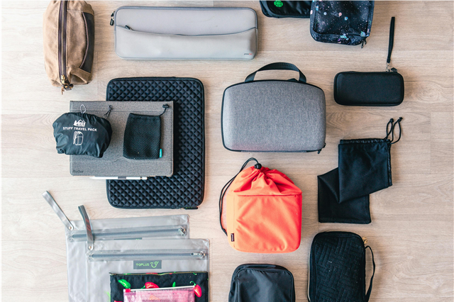 Where are waterproof phone pouches used during beach vacations?
