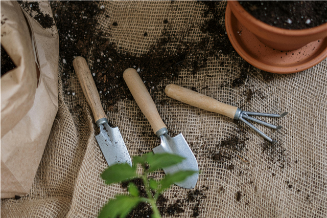 Where are wheelbarrows used in transporting soil and gardening materials?